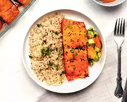 Baked salmon with roasted vegetables and brown rice