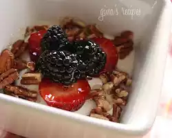 Greek yogurt with berries and a sprinkle of nuts and seeds